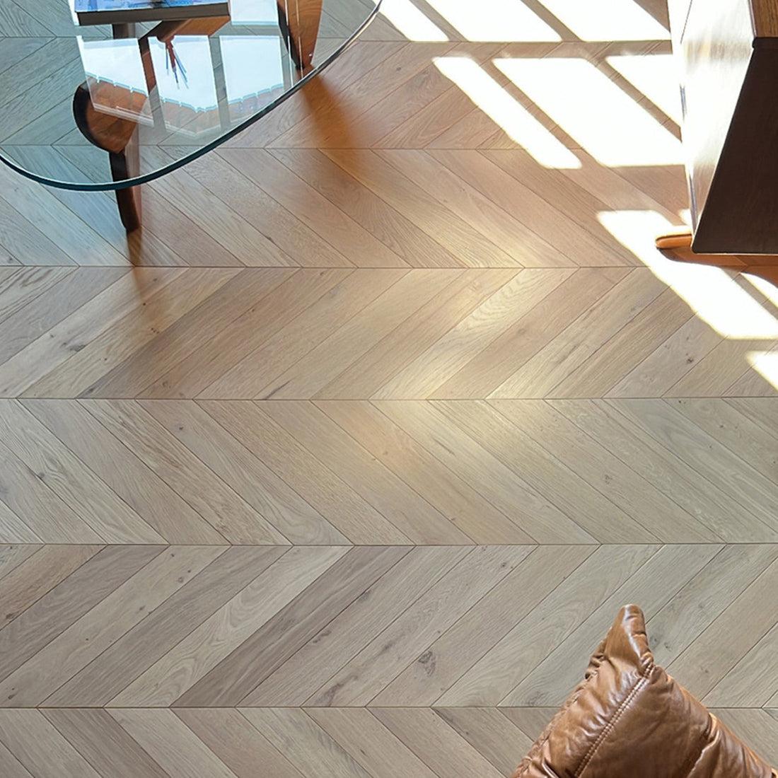 Light-oak chevron engineered parquet pattern for design-led interiors